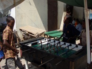 African kids playing table football in Djibouti City
